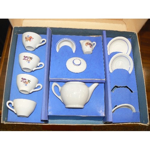 283A - BOXED LES FEERIQUES MUNDIA DOLL AND BOXED VINTAGE CHILDS CHINA TEA SET