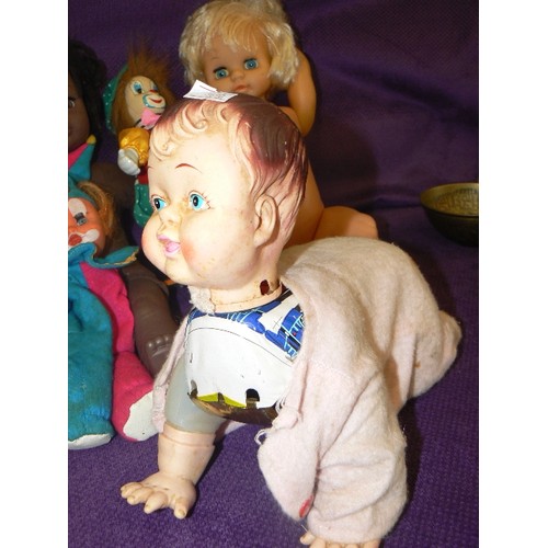 104 - COLLECTION OF VINTAGE DOLLS. INC A METAL MECHANICAL CRAWLING DOLL.