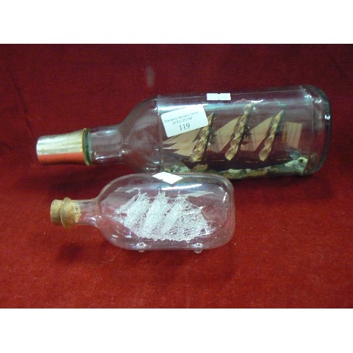 119 - SHIP IN A BOTTLE. 1 HAS A GALLEON IN A LIQUER BOTTLE, ALSO A SMALLER CRYSTAL GALLEON IN A BOTTLE.