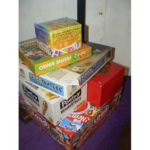 122 - STACK OF BOARD GAMES. THE LOGO BOARD GAME, GIMME FESTIVE BINGO, YAHTZEE ETC.