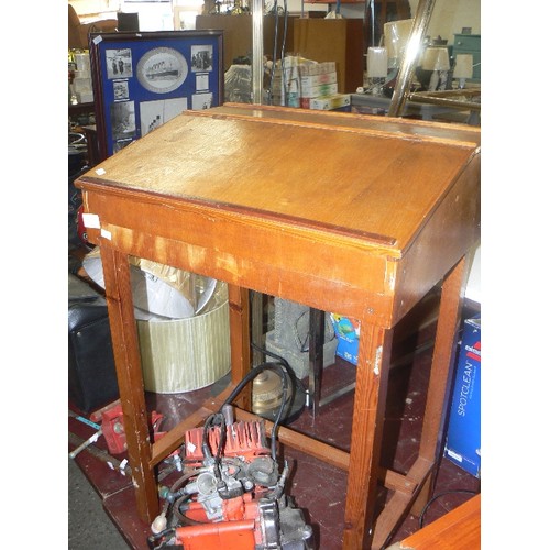 222 - CHILDS DESK WITH INGED LID. PLYWOOD, AND ON PINE LEGS.