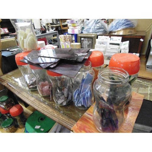 257 - 12 LARGE JARS OF COLOURED HOBBY GLASS FOR LEADED/STAINED GLASS WORK. ALSO SOME LOOSE PIECES.