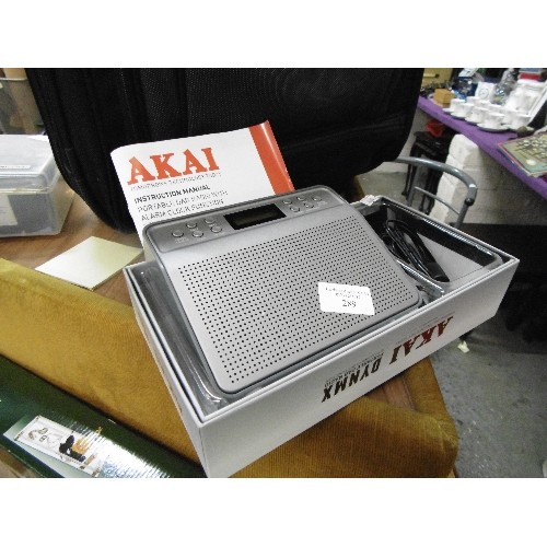 289 - AKAI PORTABLE DB RADIO WITH ALARM FUNCTION. APPEARS NEW WITH BOX & INSTRUCTIONS.