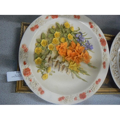 444 - RESIN HANGING PLATES OF FLOWERS AND A FRAMED FLOWER DISPLAY PIECE