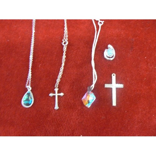 24 - THREE NECKLACES WITH PENDANTS 2 ARE SILVER PLUS A CROSS ALSO SILVER