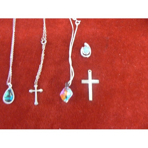 24 - THREE NECKLACES WITH PENDANTS 2 ARE SILVER PLUS A CROSS ALSO SILVER