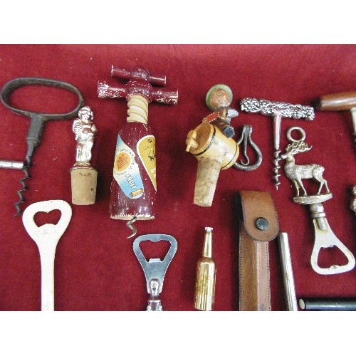 113 - BOX OF DECORATIVE WINE ITEMS. POURERS, STOPPERS, BOTTLE OPENERS ETC.