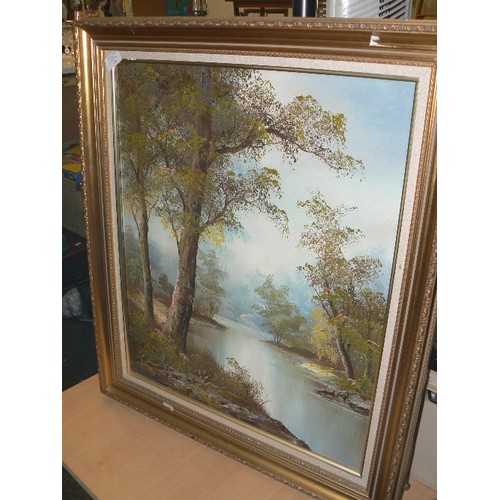 178 - OIL ON CANVAS OF BEAUTIFUL TREE-LINED LAKE. IN GILT FRAME. SIGNED C.INNES?