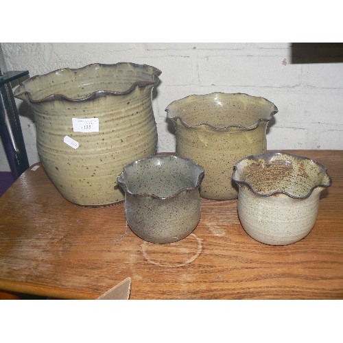 135 - SET OF 4 STONEWARE PLANTERS WITH FRILLED EDGE.