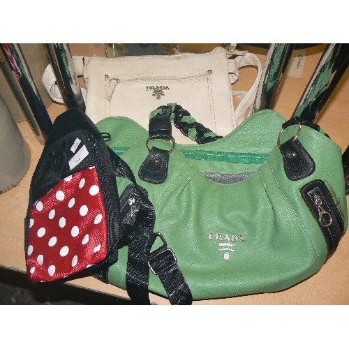 186 - A SMALL MICKY/MINI-MOUSE BACKPACK, AND 2 X PRADA-STYLE HANDBAGS.