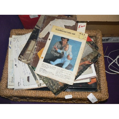 143 - QUANTITY OF VINTAGE KNITTING PATTERNS, KNITTING NEEDLES, BUTTONS ETC ETC, CONTAINED IN A BASKET AND ... 