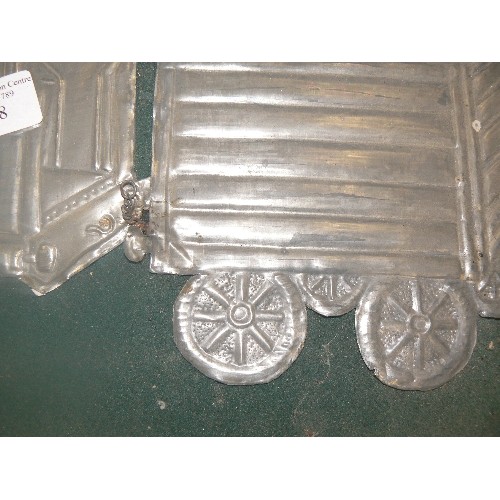 268 - PRESSED TIN STEAM LOCOMOTIVE WITH COAL TRUCK. ON BAISE BACKING AND FRAMED.