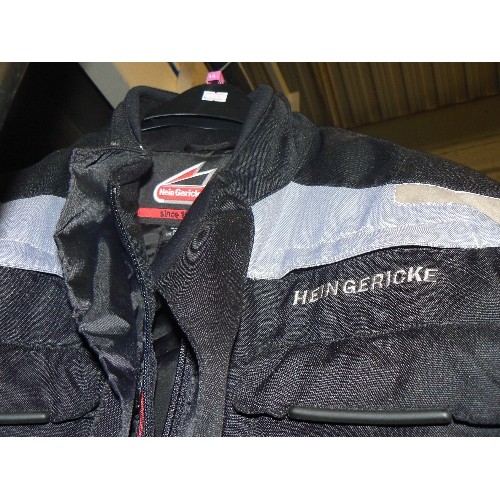 188 - HEIN GERICKE MOTORCYCLE JACKET. SIZE M. APPEARS GOOD CONDITION. BLACK WITH GREY DETAIING. PADDED INN... 