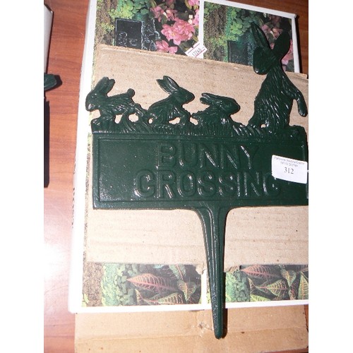 312 - 2 X CAST IRON GARDEN SIGNS ON STAKES. NEW/BOXED AND PAINTED GREEN. 'BUNNY CROSSING' AND 'DUCK CROSSI... 