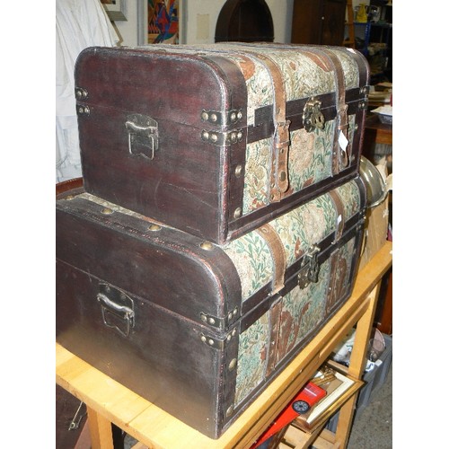 345 - 2 X VINTAGE STYLE TRUNKS. TAPESTRY AND HEAVY STRAP DETAIL. SMALLER FITS INSIDE LARGER.