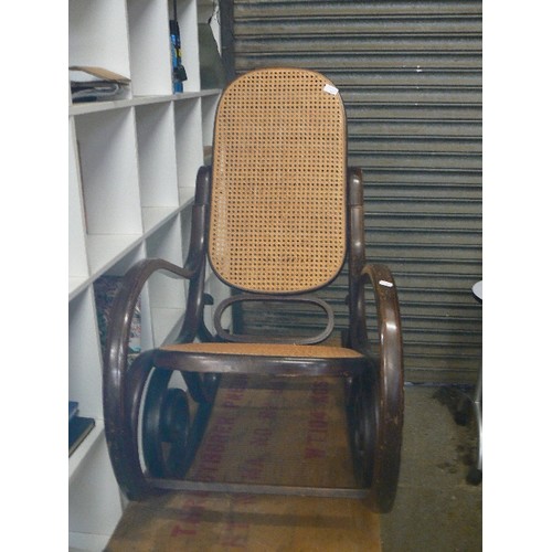 463 - VINTAGE BENTWOOD ROCKING CHAIR WITH RATTAN SEAT & BACK.