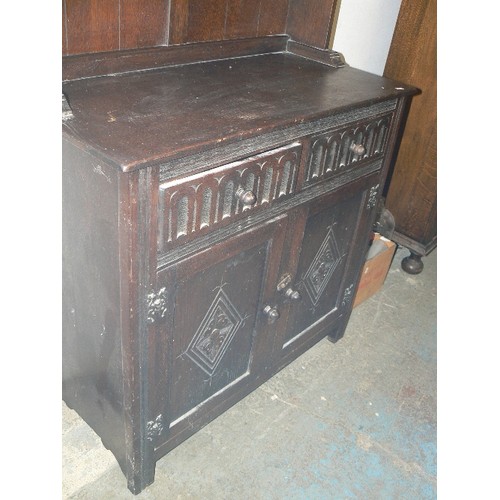 479 - OLD CHARM STYLE SMALL WELSH DRESSER, WITH ARCHED TOP, AND CARVED DOORS AND DRAWERS.