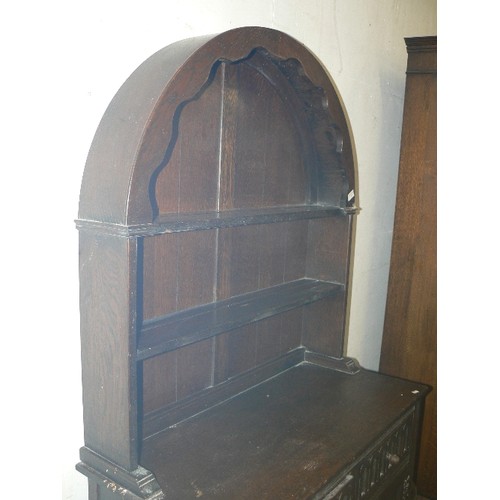 479 - OLD CHARM STYLE SMALL WELSH DRESSER, WITH ARCHED TOP, AND CARVED DOORS AND DRAWERS.