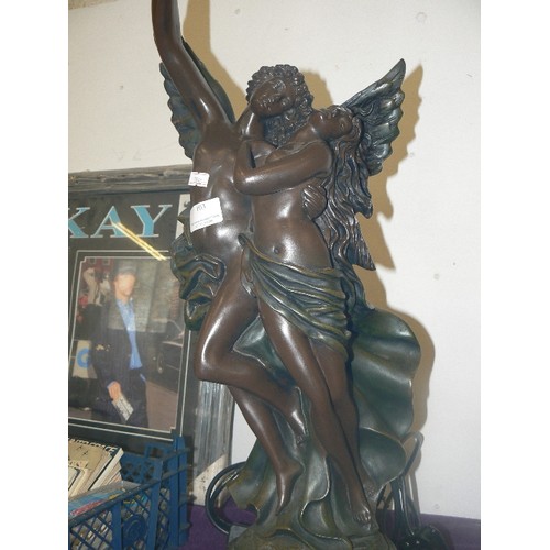 103 - LARGE & IMPOSING GRECIAN-STYLE LAMP BASE. SEMI-NUDES WITH WINGS. CARRYING A TORCH WHICH IS THE BULB-... 