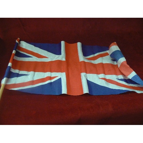 107 - 6 X SMALL UNION JACK FLAGS ON STICKS.