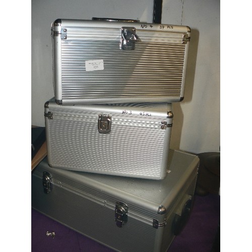 133 - 3 RIGID METAL CASES. 2 SMALL & 1 LARGER. HAVE BEEN USED TO TRANSPORT JEWELLERY.