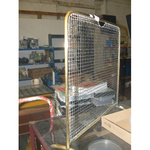 334 - SMALL BRASS-FRAMED MESH FIRE-GUARD.