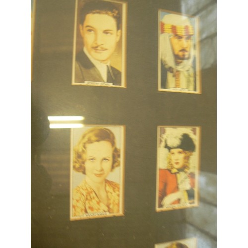 380 - CIGARETE CARDS IN LARGE GLAZED FRAME 'GALLAGHERS PORTRAITS OF FAMOUS STARS'.