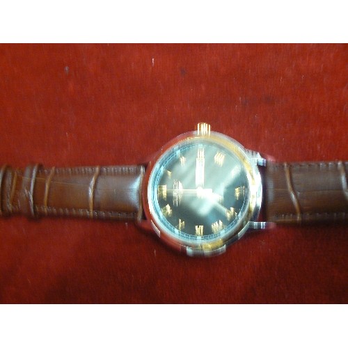 28 - A LIGE LARGE GENTS WRIST WATCH  DAY AND DATE UNWORN BROWN LEATHER STRAP