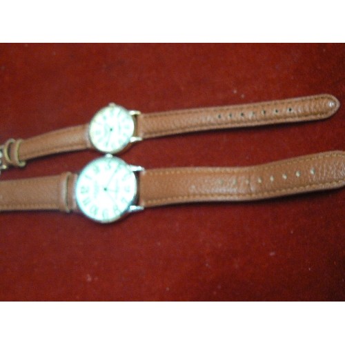 30 - A PAIR OF AZAZA LONDON WATCHES HIS AND HERS BOTH UNWORN WITH BROWN LEATHER STRAPS