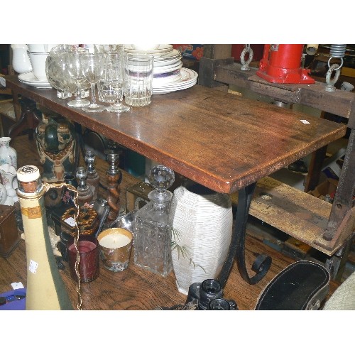 419 - SMALL WOODEN TABLE ON WROUGHT IRON LEGS.