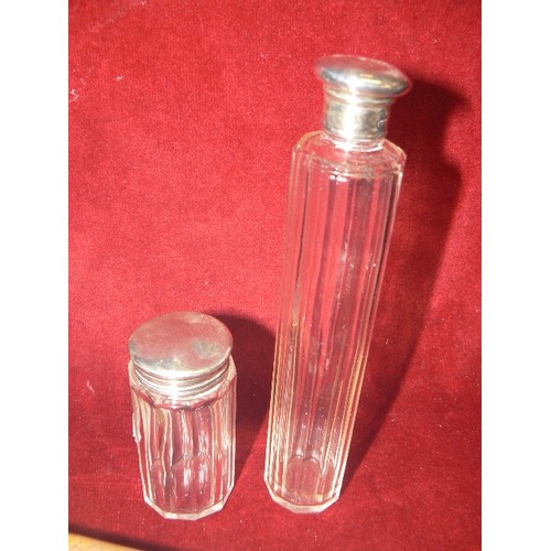 48 - 2 ANTIQUE DRESSING TABLE BOTTLES WITH SILVER TOPS