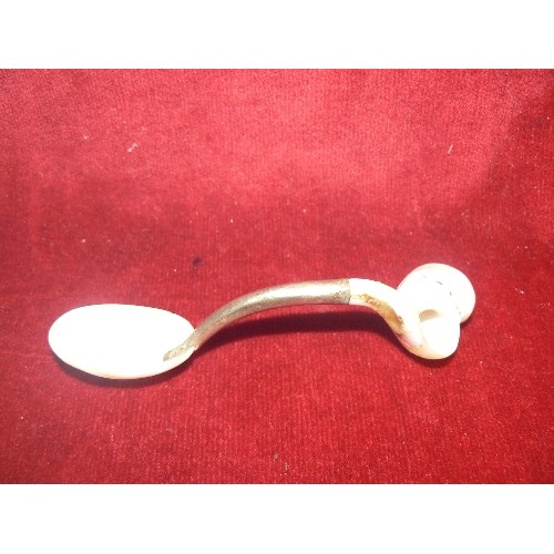 49 - A CAVIAR SPOON MADE FROM MOTHER O PEARL SEA SHELLS AND A BUTTON HOOK