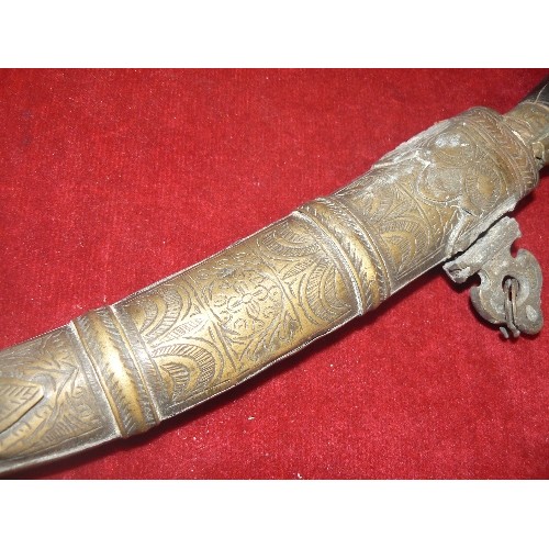 55 - AN ARABIC DAGGER WITH BONE HANDLE AND BRASS SHEATH VERY OLD