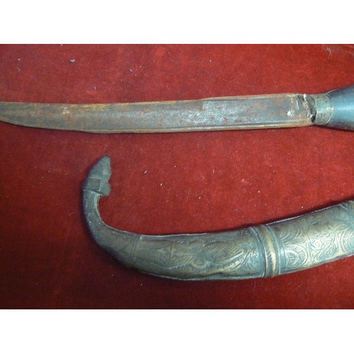 55 - AN ARABIC DAGGER WITH BONE HANDLE AND BRASS SHEATH VERY OLD