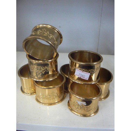 73 - SET OF 8 X BRASS NAPKIN RINGS, AND 3 X PEN-KNIVES.