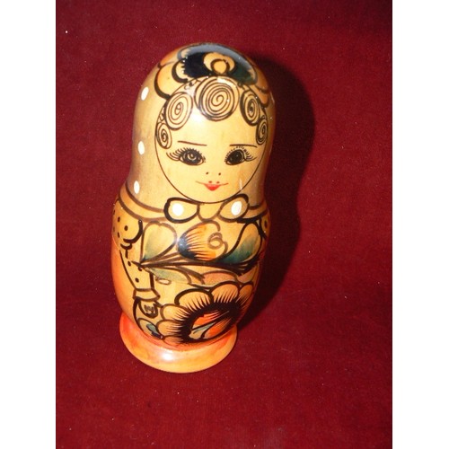 45 - A FIVE PART RUSSIAN DOLL HAND PAINTED IN VLADIVOSTOK