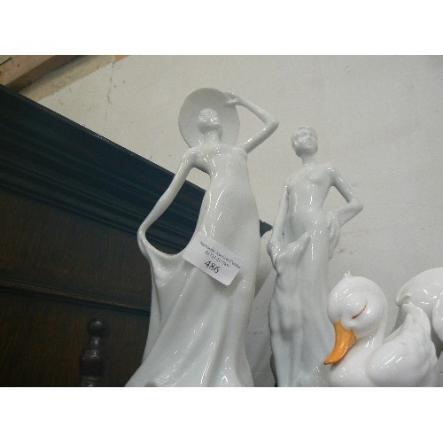 338 - WHITE PORCELAIN ORNAMENTS, A DECO STYLE FIGURE, AN ELEGANT LADY, AN ELEPHANT AND A DUCK.