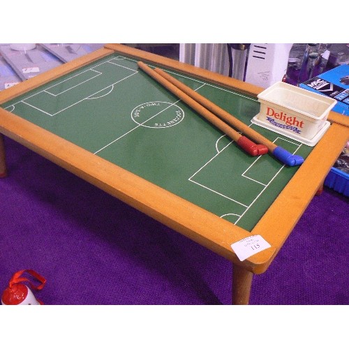 115 - TABLE-TOP FOOTBALL GAME. RAISED ON SHORT LEGS.