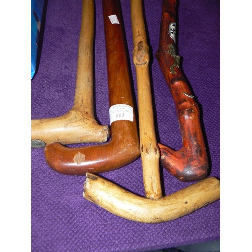 111 - 4 X VINTAGE WALKING STICKS. 1 FROM OBAN WITH STAGS HEAD PLAQUE, 2 HAND-MADE KNOBBLY STICKS.
