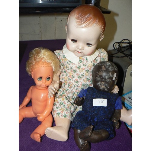 155 - VINTAGE DOLL BY PEDIGREE-ENGLAND, A BLACK BAKELITE DOLL WITH SOME DAMAGE AND A PLASTIC DOLL.