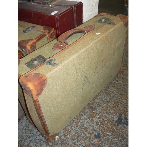 128 - 2 VINTAGE GREEN CANVAS MILITARY  SUITCASES, 1 IS STAMPED 'F LTD 1943', THE OTHER 'PAPWORTH INDUSTRIE... 