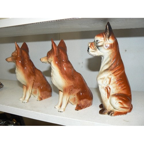 64 - PAIR OF CERAMIC FOXES AND A BOXER DOG.