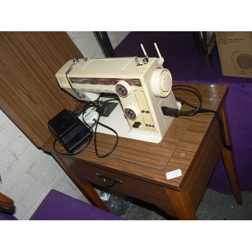 157 - RETRO-VINTAGE NEW-HOME SUPER AUTOMATIC SEWING MACHINE, BUILT INTO WOOD EFFECT SEWING TABLE.