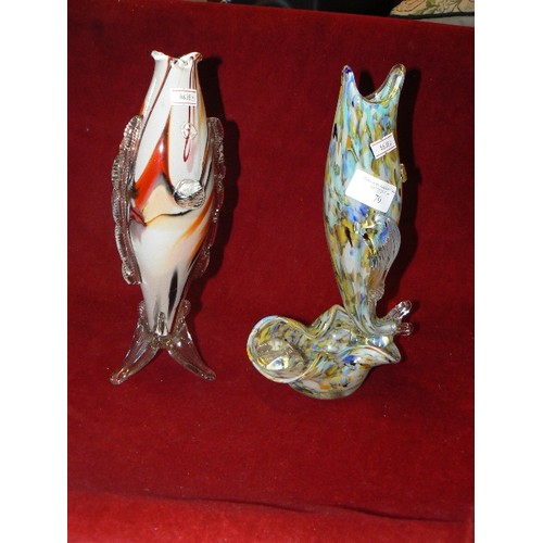 70 - 2 MURANO GLASS STANDING FISH. 1 HAS SMALL DISH AT THE BASE, IN LOVELY YELLOWS AND BLUES, THE OTHER I... 