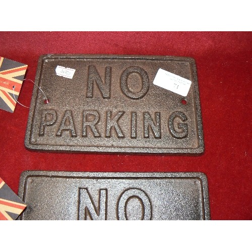 71 - 2 SMALL CAST IRON 'NO PARKING' SIGNS. NEW/WITH TAGS.