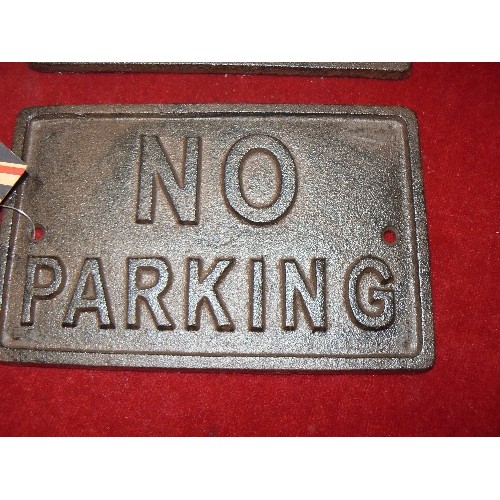 71 - 2 SMALL CAST IRON 'NO PARKING' SIGNS. NEW/WITH TAGS.