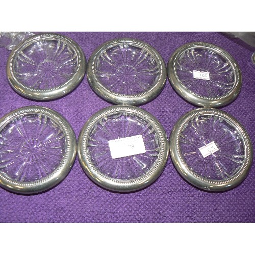 78 - SET OF 6 ITALIAN CUT-GLASS COASTERS WITH SILVER-PLATED RIMS.