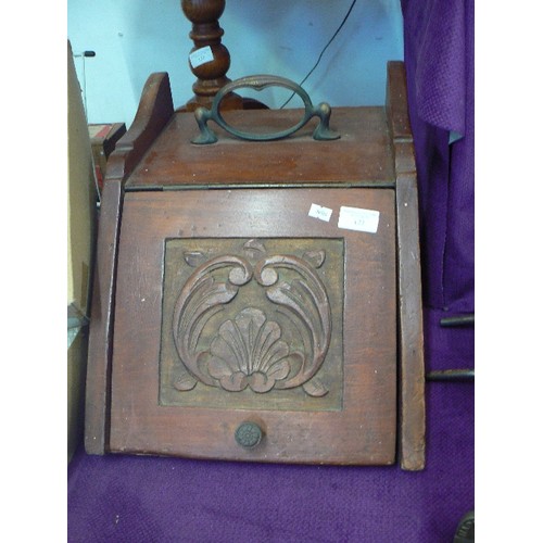 122 - WOODEN COAL BOX WITH CARVED FRONT PANEL. BRASS HANDLE.