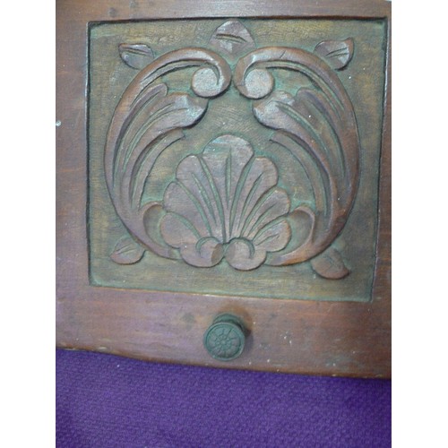 122 - WOODEN COAL BOX WITH CARVED FRONT PANEL. BRASS HANDLE.