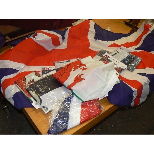 129 - 10 X NEW FLAGS WITH BRASS EYELETS. PACKAGED. INC UNION JACK AND WELSH FLAG.